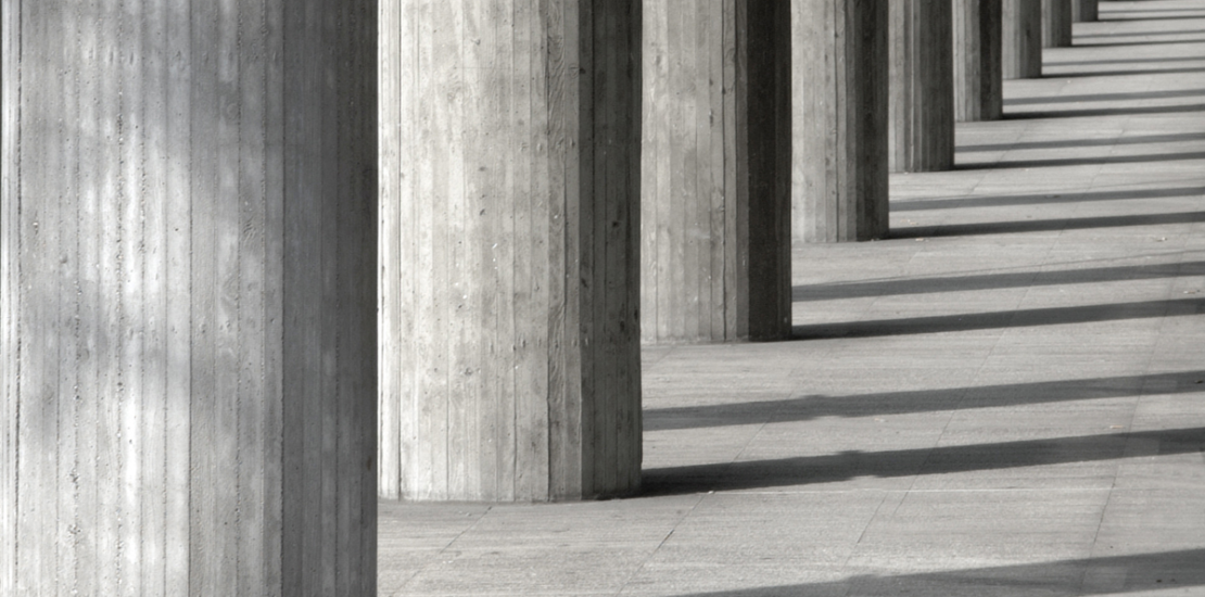 Concrete columns as the strategic foundation of purpose, values, and vision, Clarion Consulting